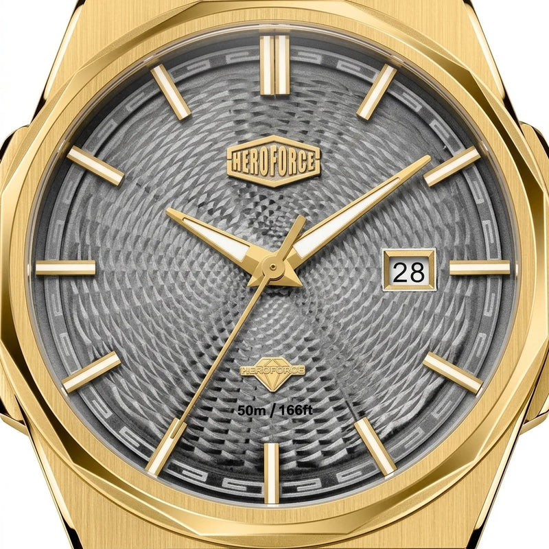 Upclose view of Gold-tone stainless steel watch with grey textured dial, date display, and integrated bracelet