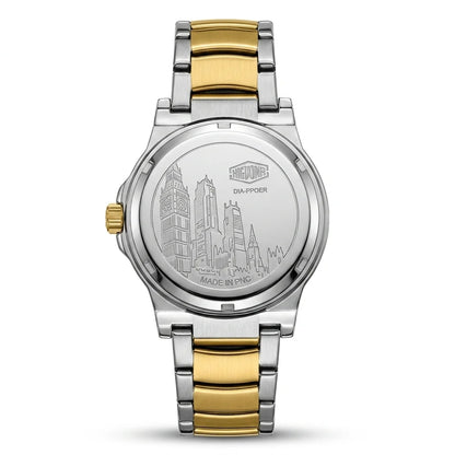 A two-tone stainless steel and gold watch shown from the back, featuring an engraved cityscape design on the polished silver case back and a matching two-tone metal link bracelet.