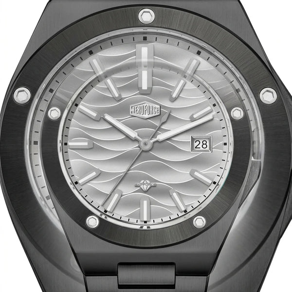 Close up - Black stainless steel wristwatch with a silver wave patterned dial and date display.