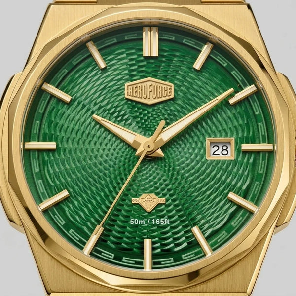 Upclose macro view of Gold-tone stainless steel watch with green textured dial, date display, and integrated bracelet