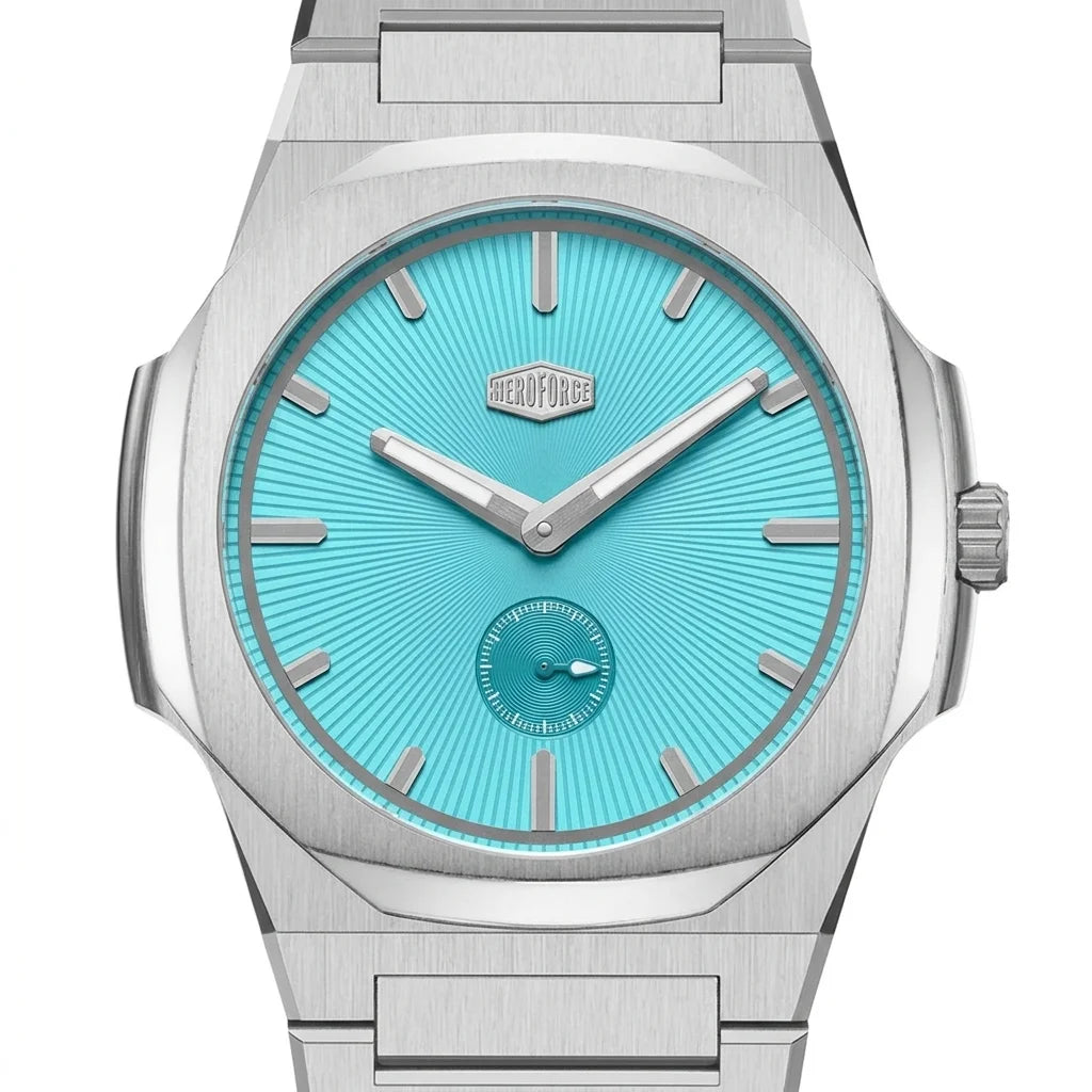 Upclose view - Stainless steel wristwatch with turquoise sunburst dial, silver markers, and small seconds subdial